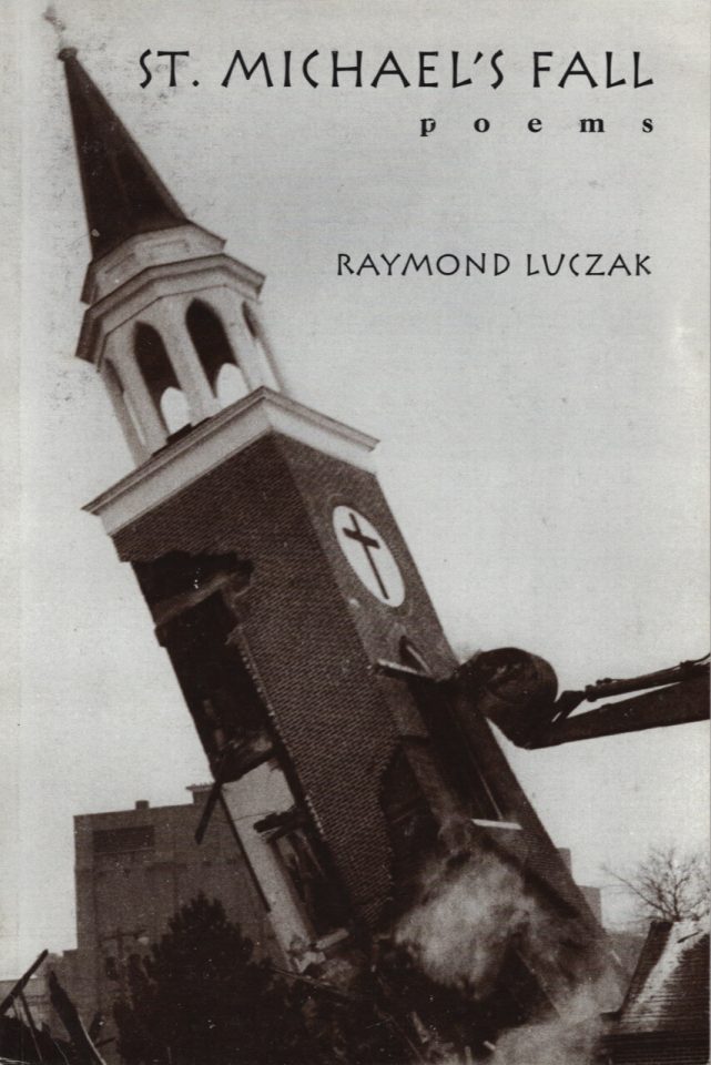The black-and-white photograph shows a tall crane striking down a church spire. Above is the text ST. MICHAEL'S FALL | poems | RAYMOND LUCZAK.