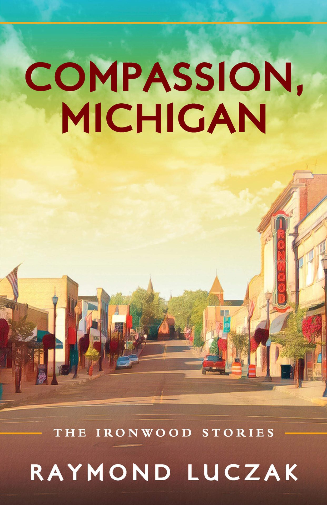 A quiet street in the downtown of a small town shows a few cars parked in the distance; large shadows cross the street. Above the town is a green-yellow-tint of a cloudy sky. Across the sky is the text COMPASSION, MICHIGAN. In the bottom of the street image is the text THE IRONWOOD STORIES | RAYMOND LUCZAK.